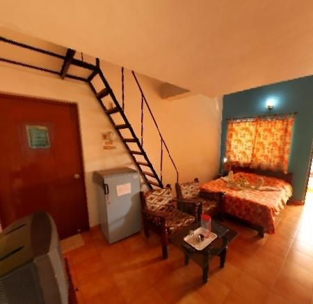 Hotel Germany Calangute Quarto foto