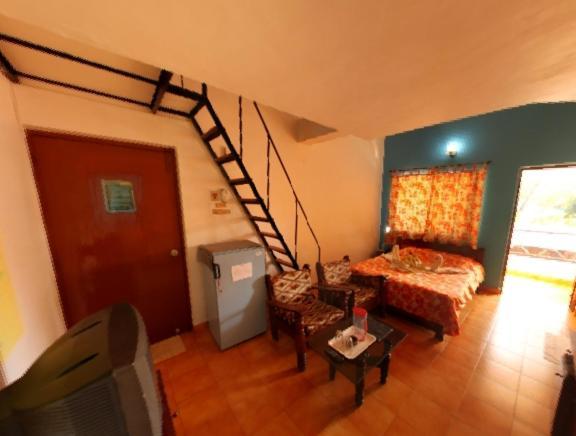 Hotel Germany Calangute Quarto foto