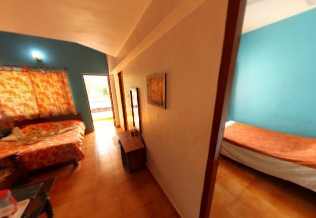 Hotel Germany Calangute Quarto foto